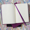 The BLOX A5 Notebook in Plum with Blank Cream Pages and Ribbon Page Markers